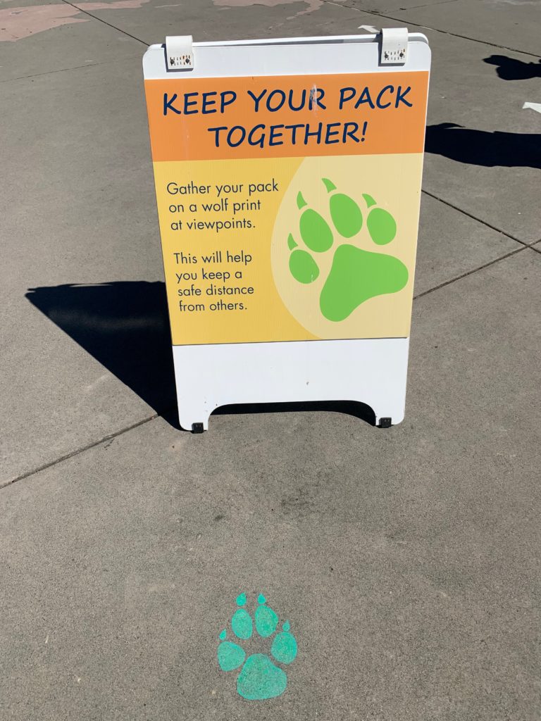 zoo sign: keep your pack together