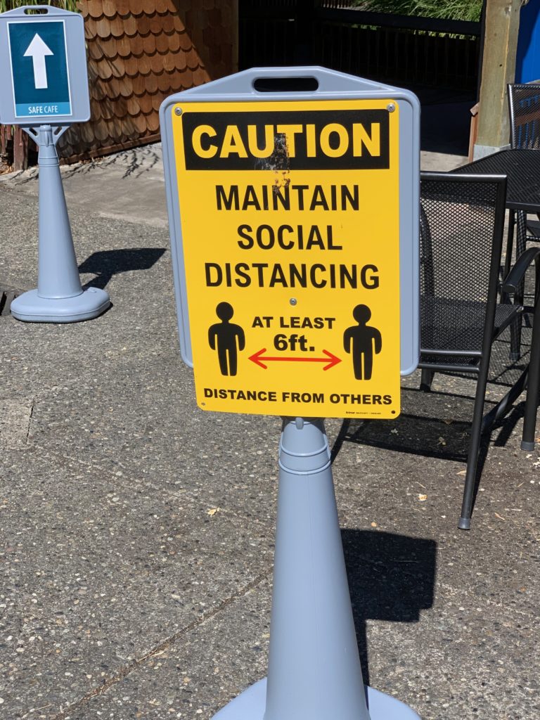 zoo sign: maintain social distancing