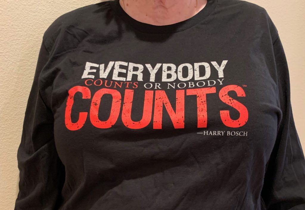 T shirt that reads "Everybody counts or nobody counts. --Harry Bosch" --Harry Bosch"