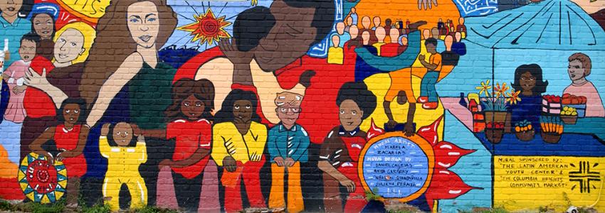 Painted wall mural featuring portraits of People of Color