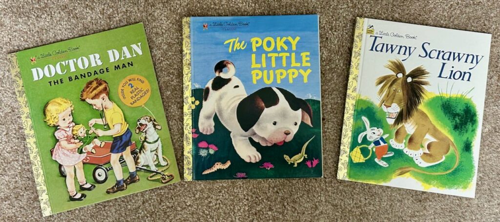 Three Little Golden Books: Doctor Dan the Bandage Man, The Poky Little Puppy, Tawny Scrawny Lion